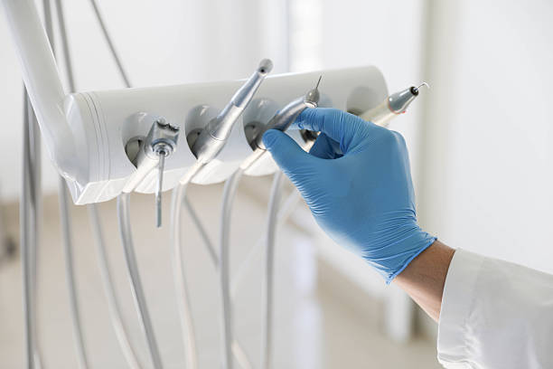 Professional Tooth Extraction technician working in Trego County County, KS